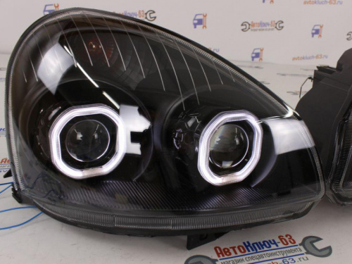 Тюнинг фары Приора с двумя Би линзами ангельскими глазками черной маской