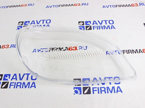 Стекло правой фары старого образца на Шевроле Нива