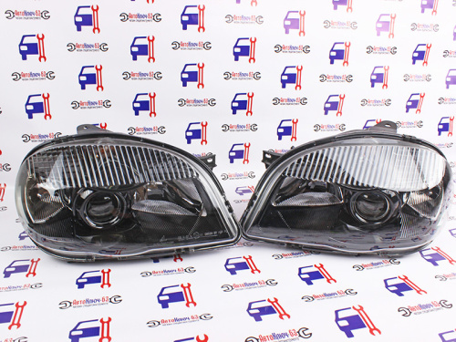 Оригинальные черные фары с линзой на Шевроле Нива