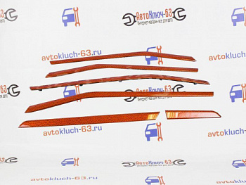 Молдинги салона оранжевый карбон на Лада Веста